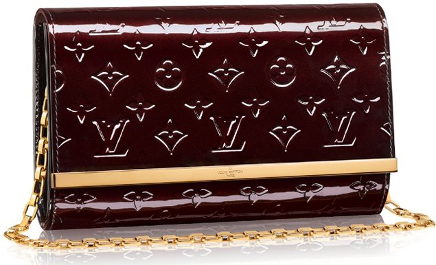 Ana leather clutch bag Louis Vuitton Beige in Leather - 25261553