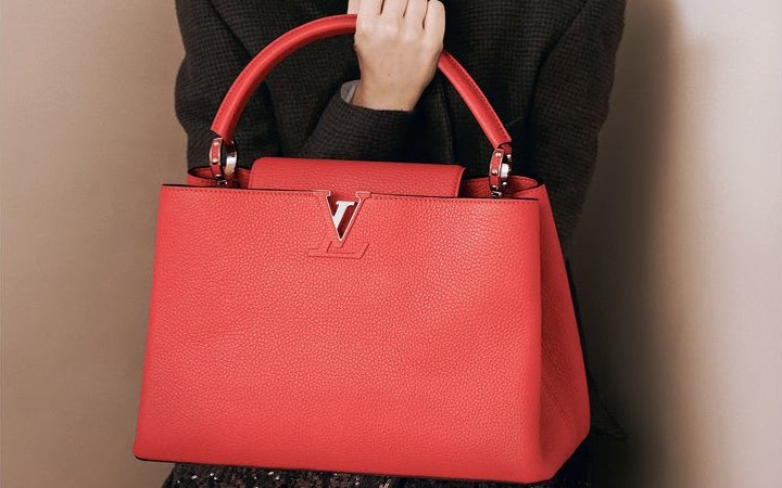 bagfetishperson: Diane Kruger and Louis Vuitton Capucines