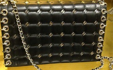 A Closer Look Chanel Metal CC Signature Clutch Bag thumb