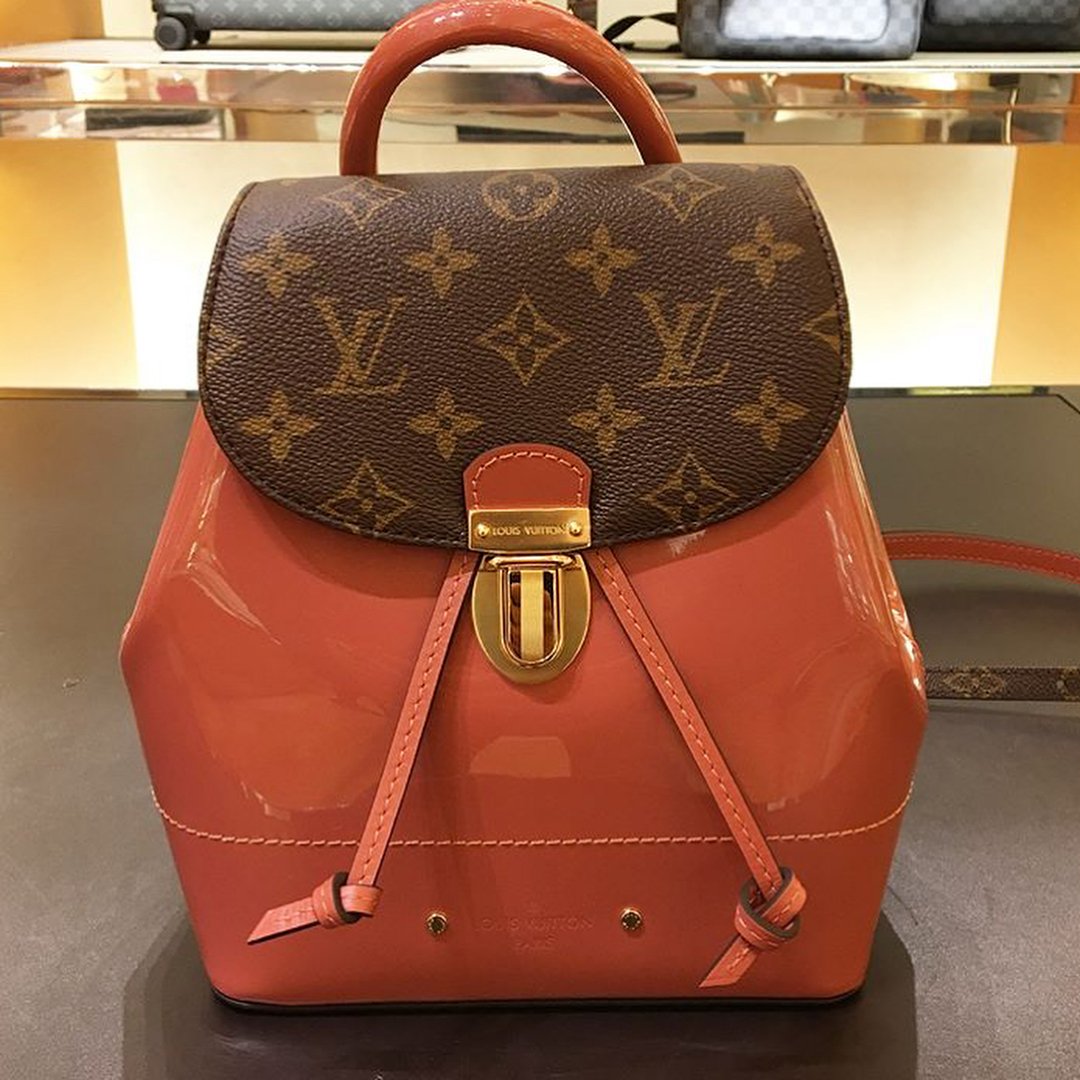 LOUIS VUITTON Hot Springs Backpack White Monogram and Patent Leather –  Debsluxurycloset