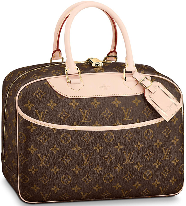 Louis Vuitton monogrammed bowling vanity canvas handbag with leather trim  and handles photographed on a white background Stock Photo - Alamy