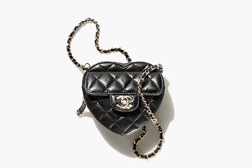 The Chanel Mini 22 is Giving Me an Existential Crisis - PurseBlog